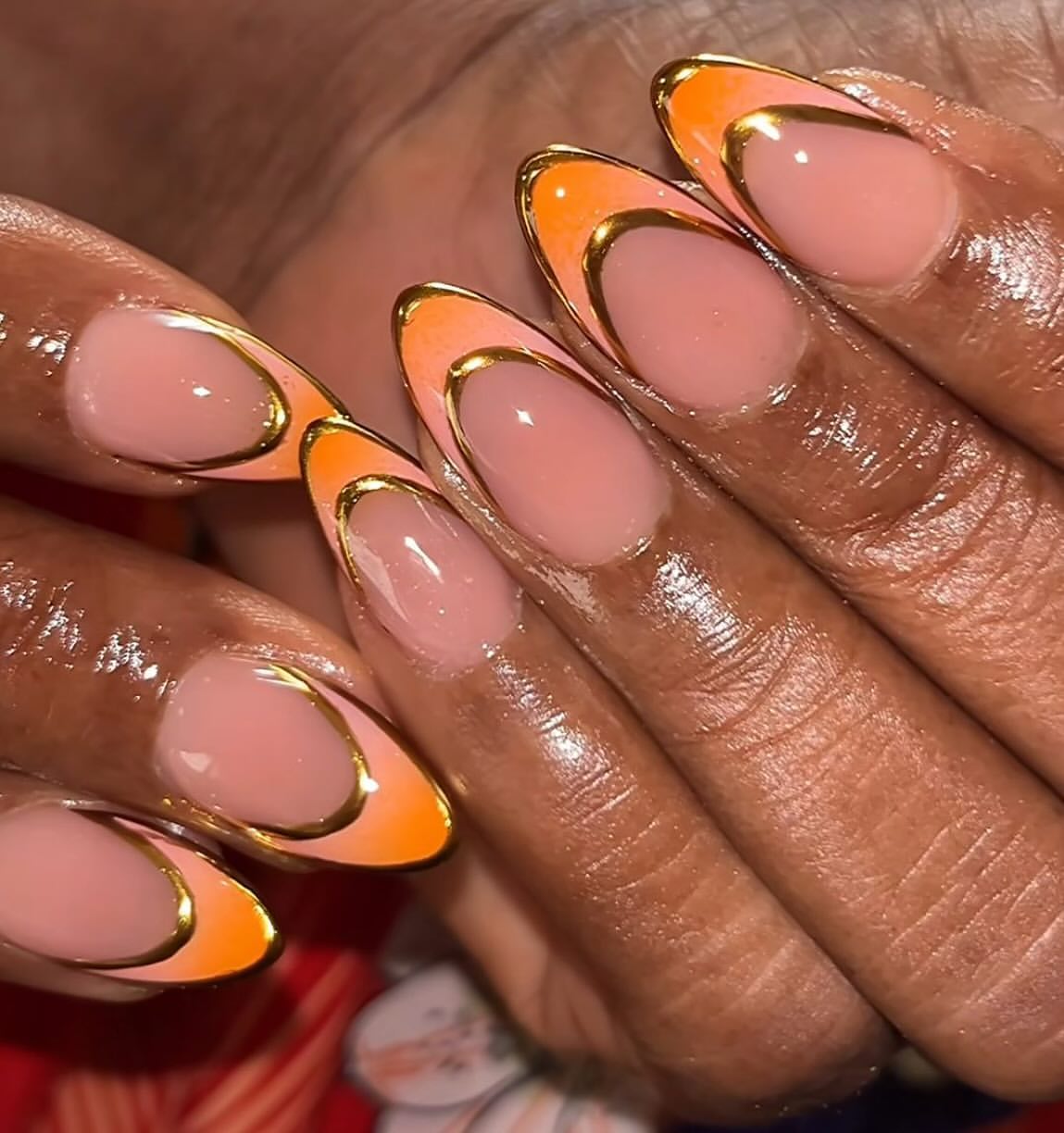 Orange custom nail set by Brickk Nailz